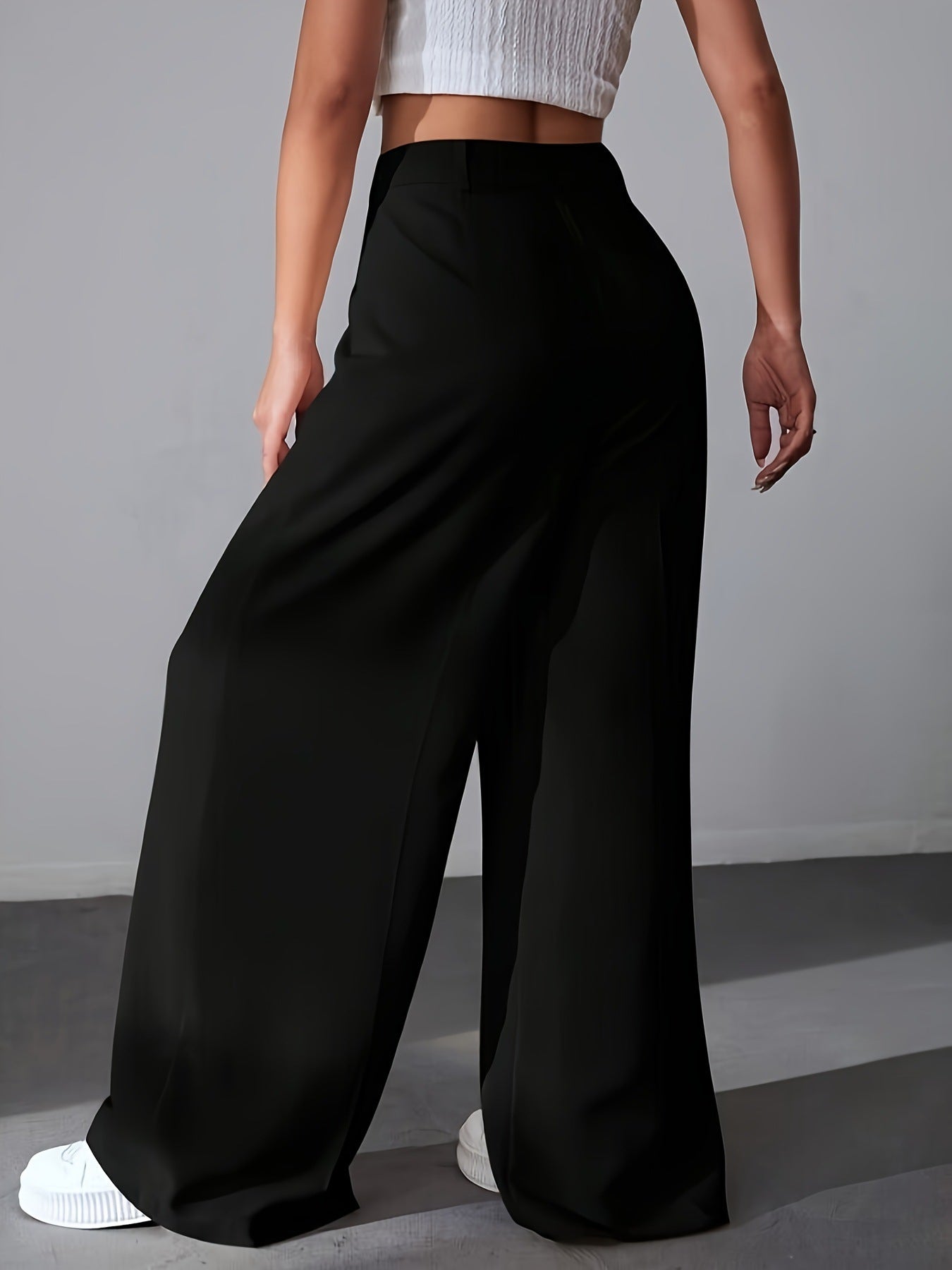 Black wide leg palazzo pants with a cropped white top for chic fashion styling