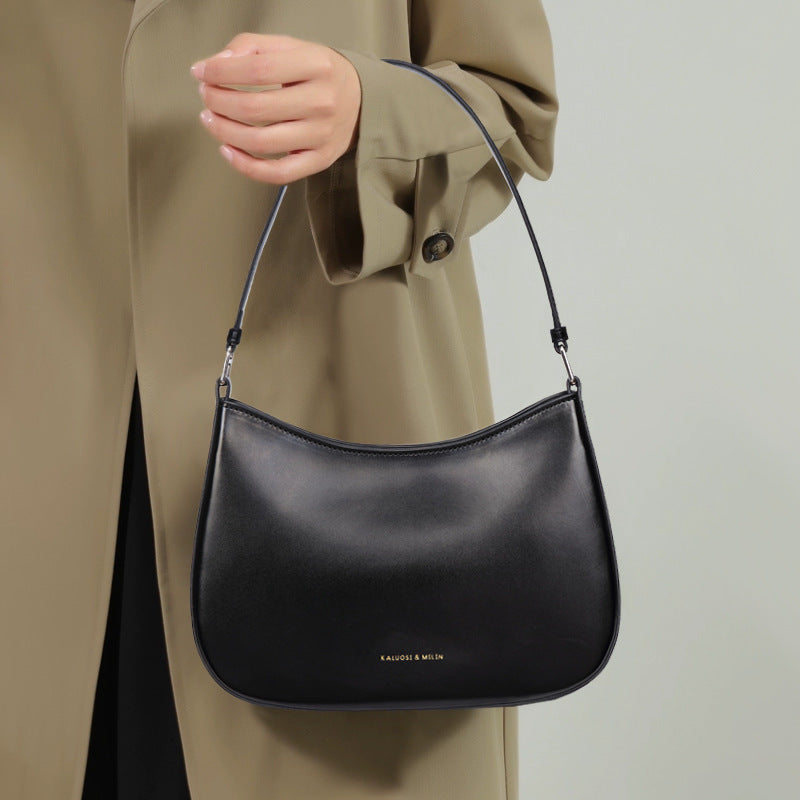 Black leather shoulder bag from Special Interest Design Bag, perfect for fashion and ملابس