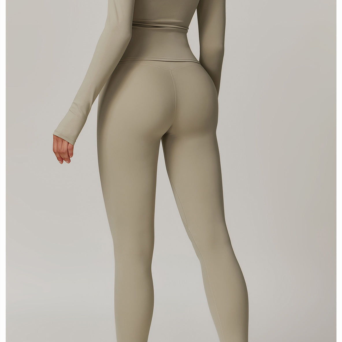 Beige long-sleeved athletic bodysuit and leggings for outdoor running sports fitness suit