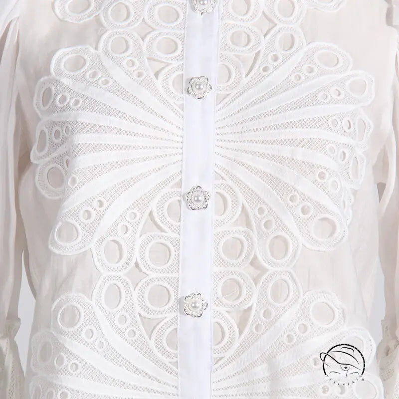White embroidered blouse with artistic palace embroidery buttons