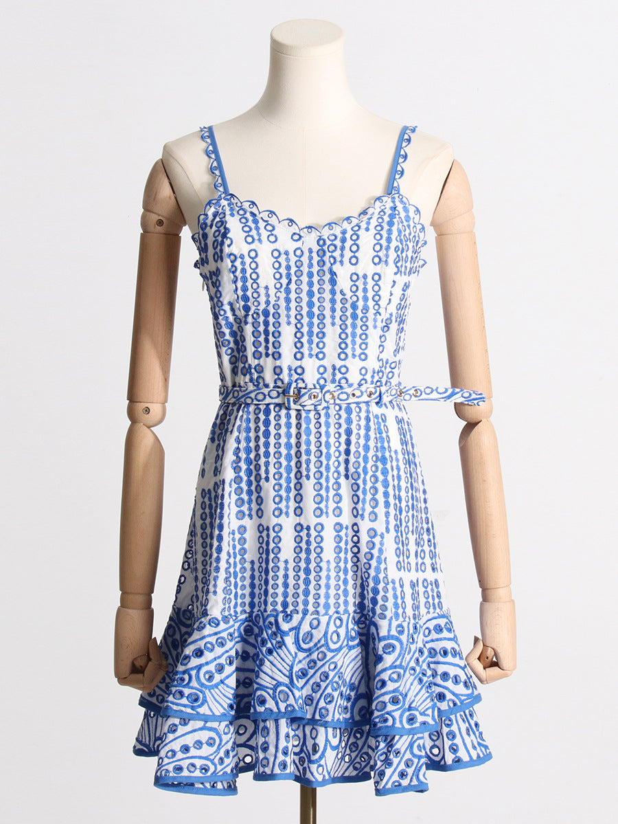 Blue and white patterned sundress showcasing fashion and langry style with ruffled hem