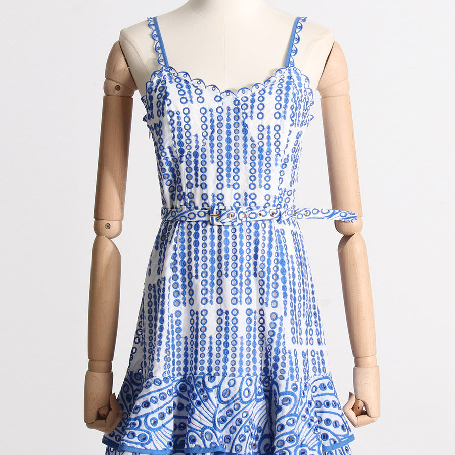 Blue and white patterned sundress showcasing fashion and langry style with ruffled hem