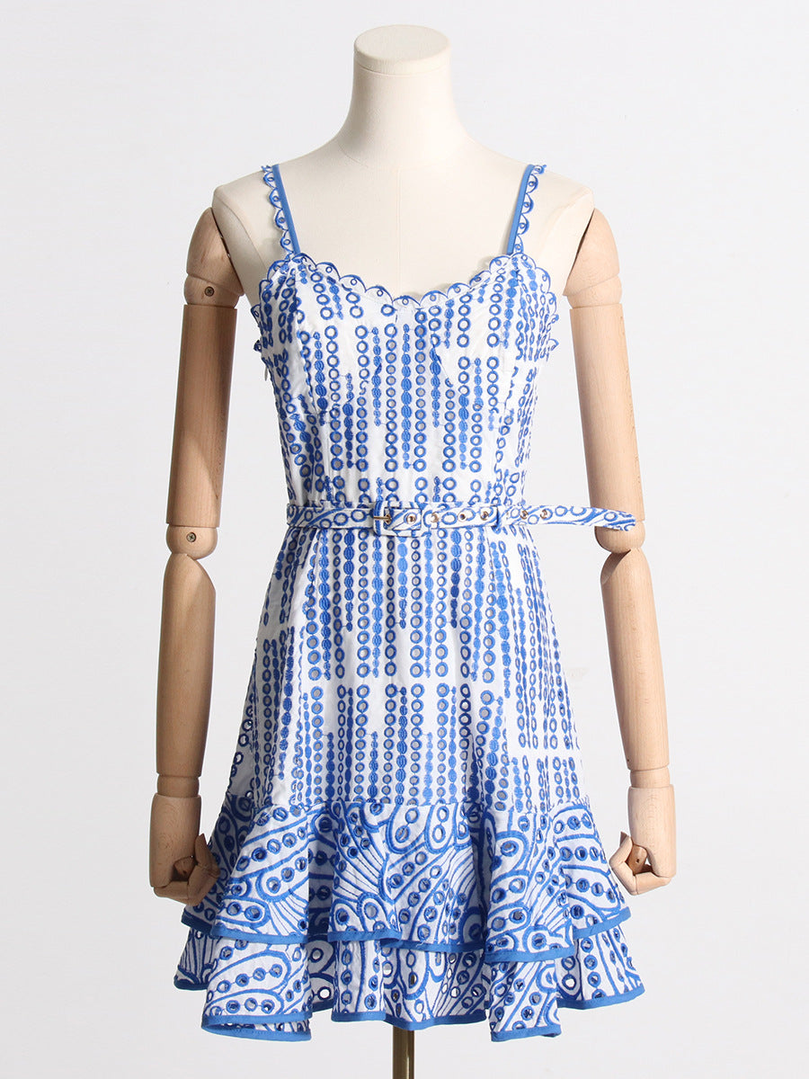 Blue and white patterned sundress showcasing fashion and langry style with ruffled hem