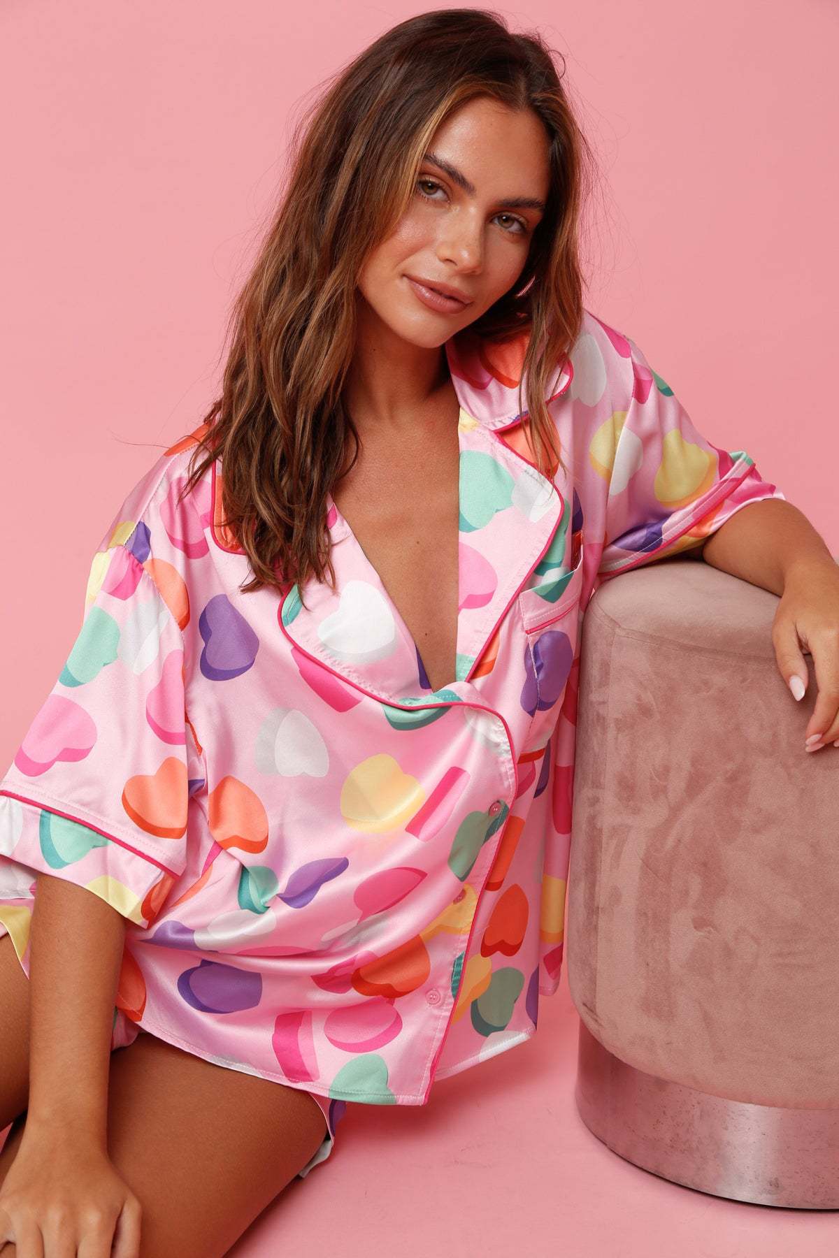 Pink satin pajama top with colorful heart patterns from the cute two piece set pajamas