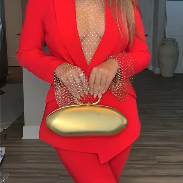 Woman in red suit with gold clutch showcasing Casual Professional Pants Two Piece Sets, fashion style