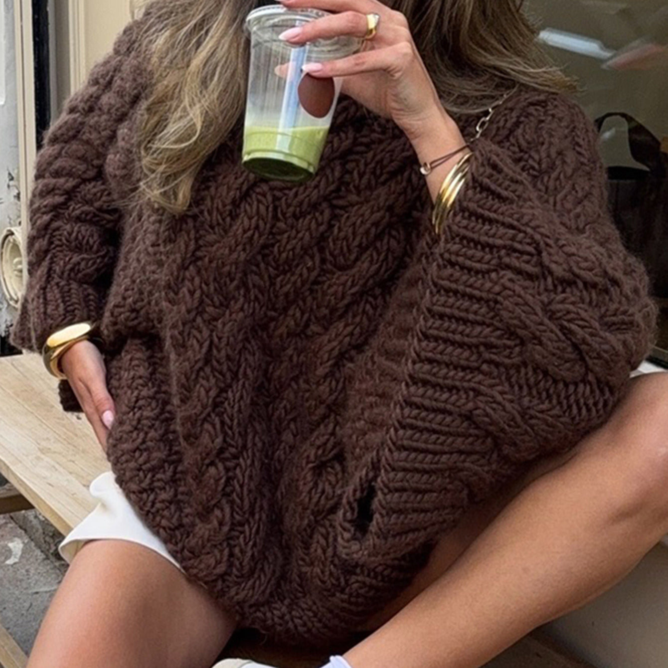 Brown cable knit long sleeve oversized sweater with gold buttons