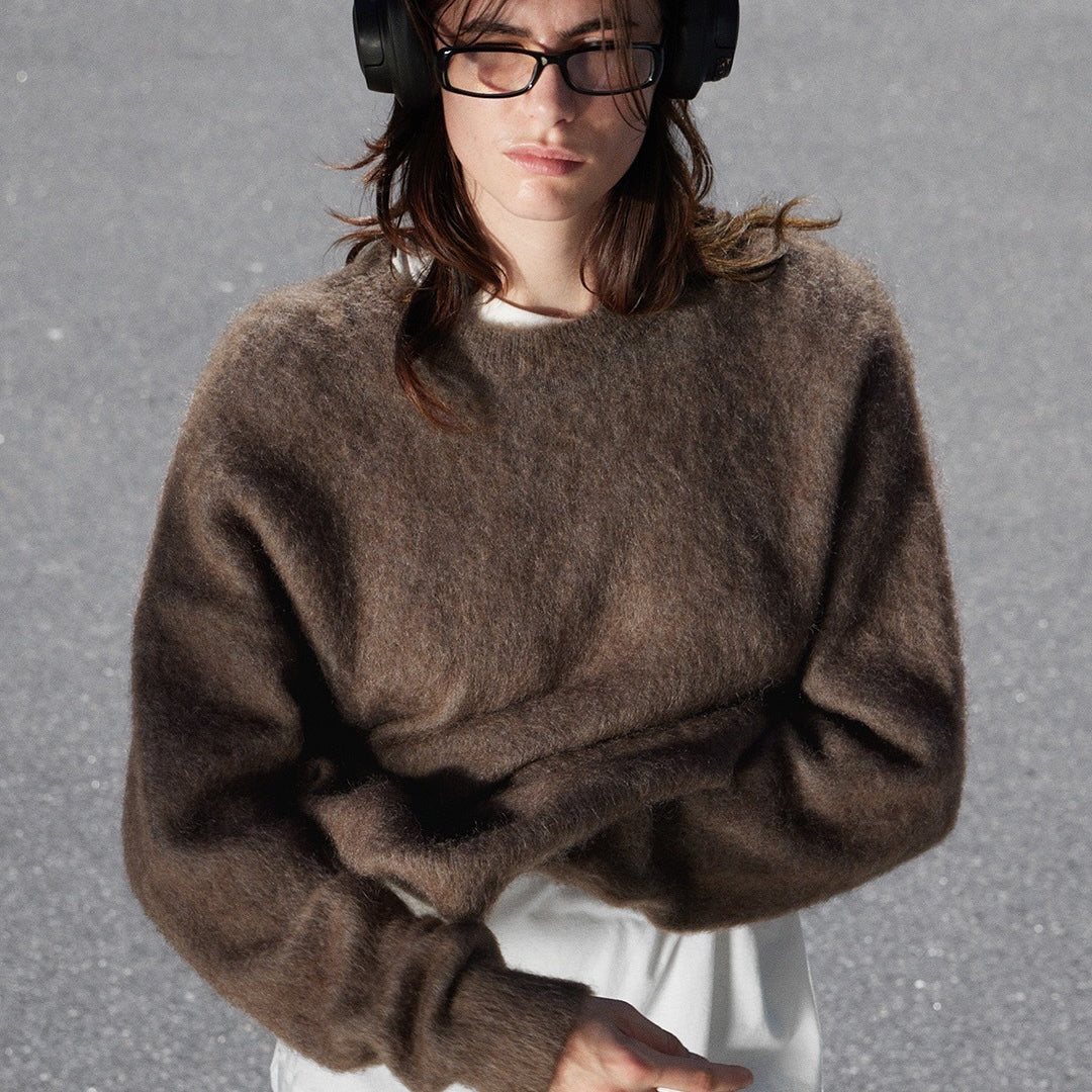 Brown wool alpaca sweater with oversized sleeves and white inner layer