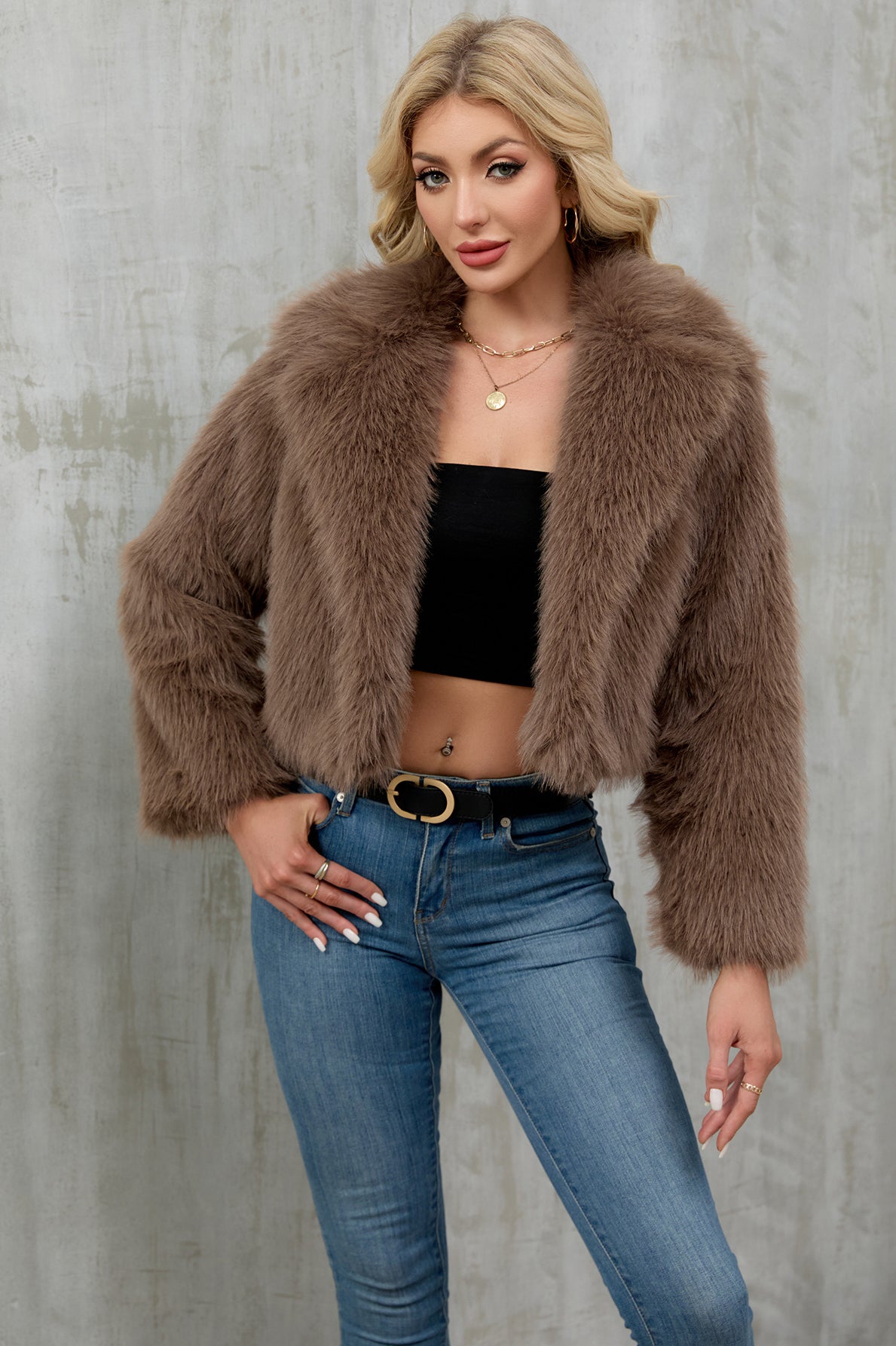 Plush faux fur cropped jacket with fluffy texture and long sleeves