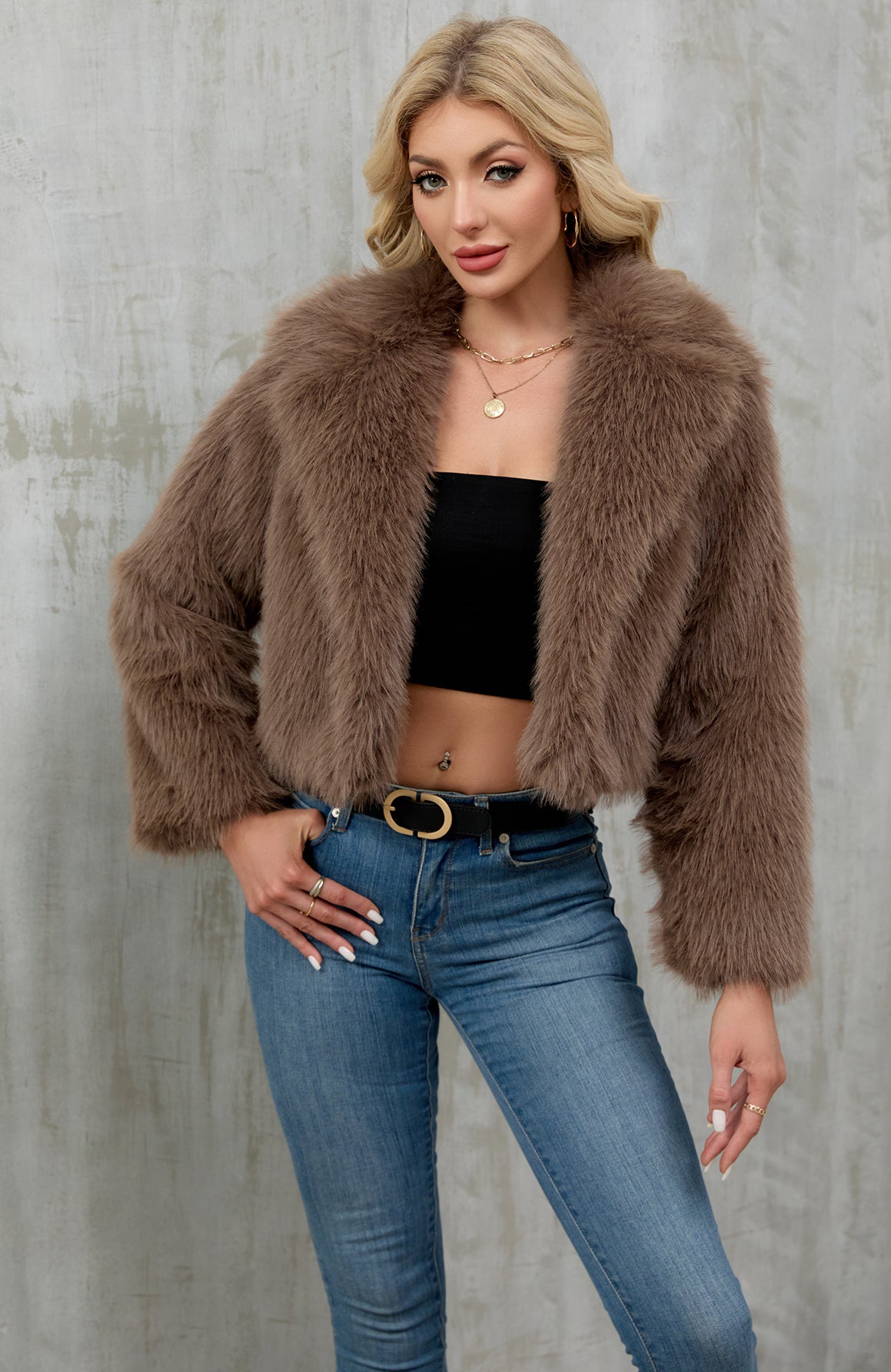 Plush faux fur cropped jacket with fluffy texture and long sleeves