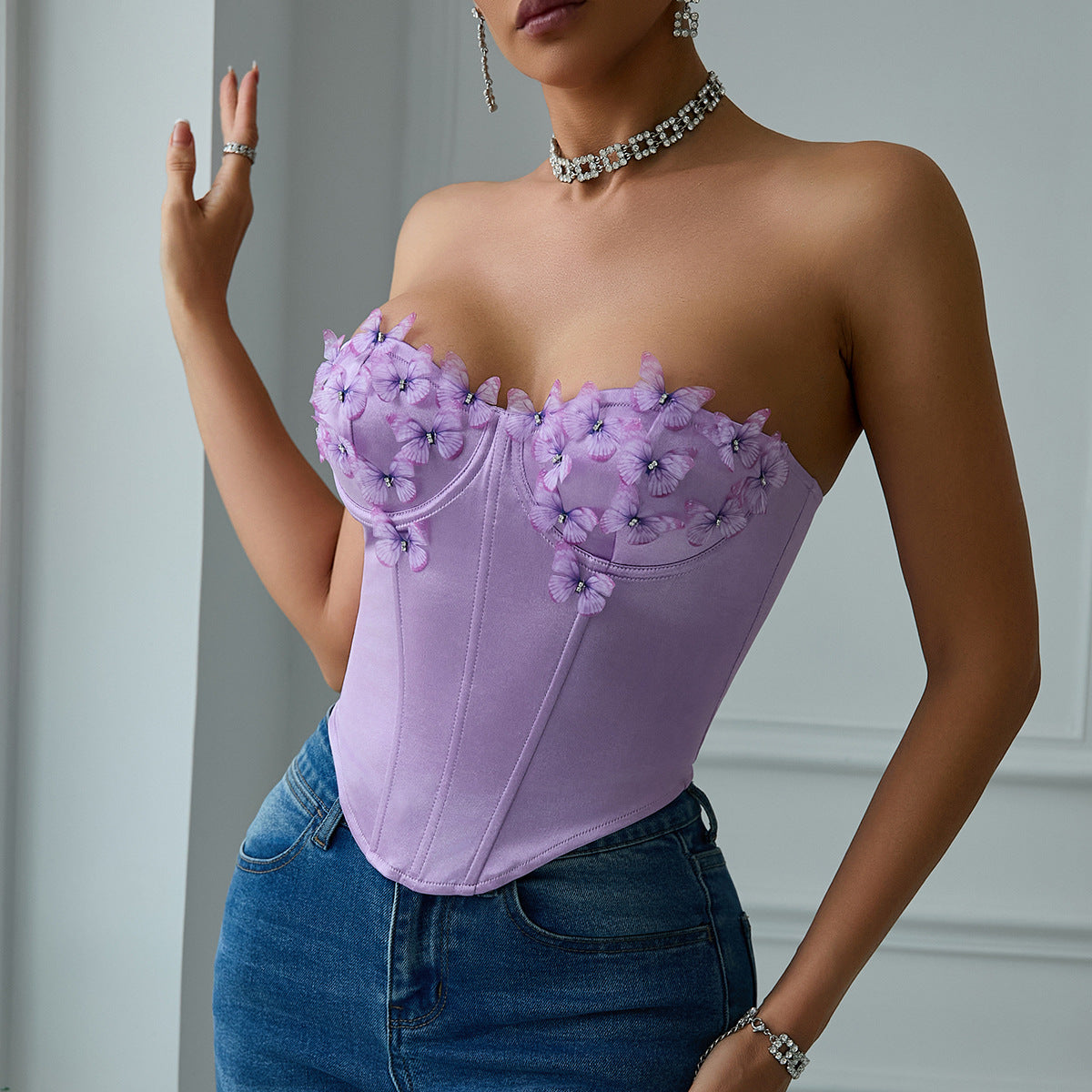 Low cut satin butterfly tube top featuring floral embellishments and diamond steel ring boning