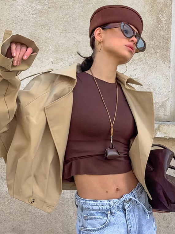 Brown leather crop top with knot detail in Langry double breasted trench coat