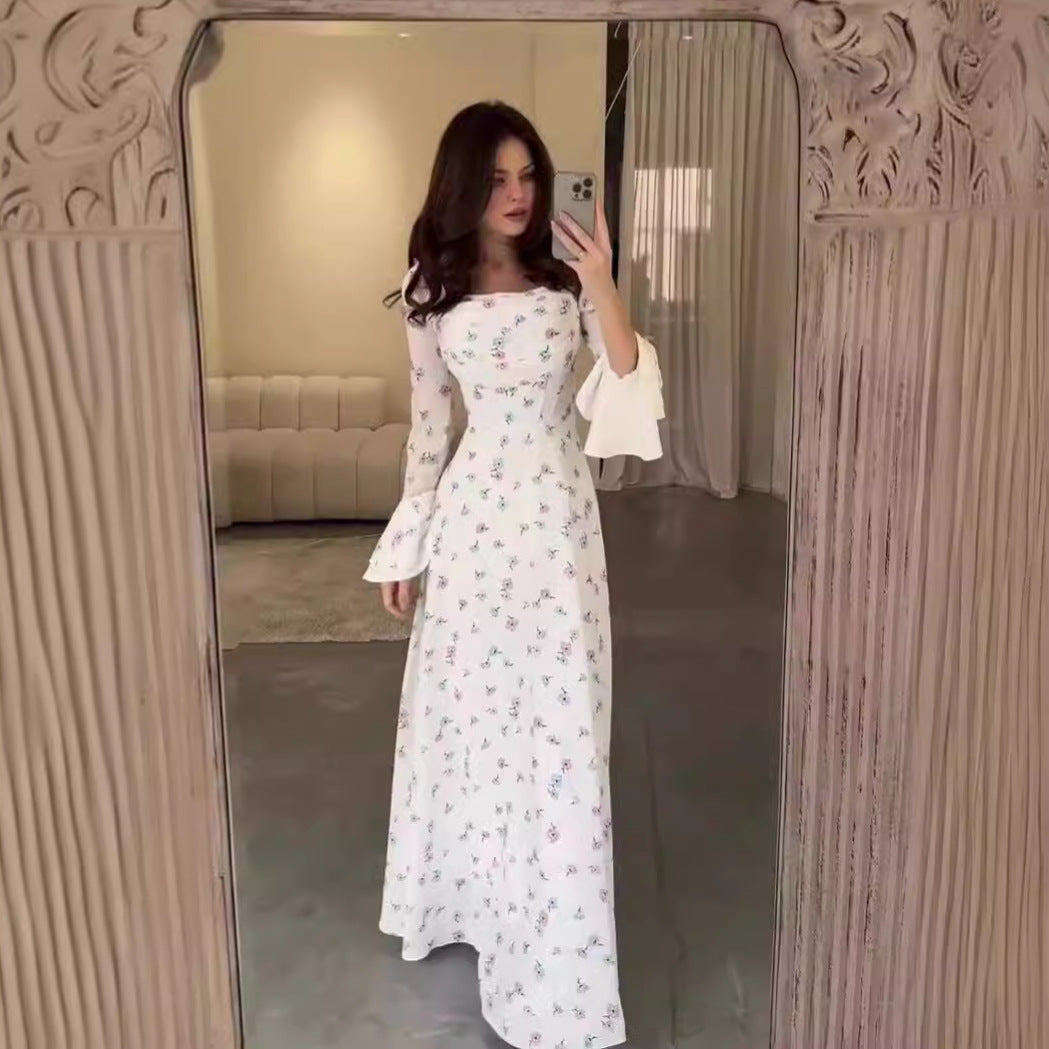 Floral print long-sleeved white dress with flared sleeves, perfect for summer fashion