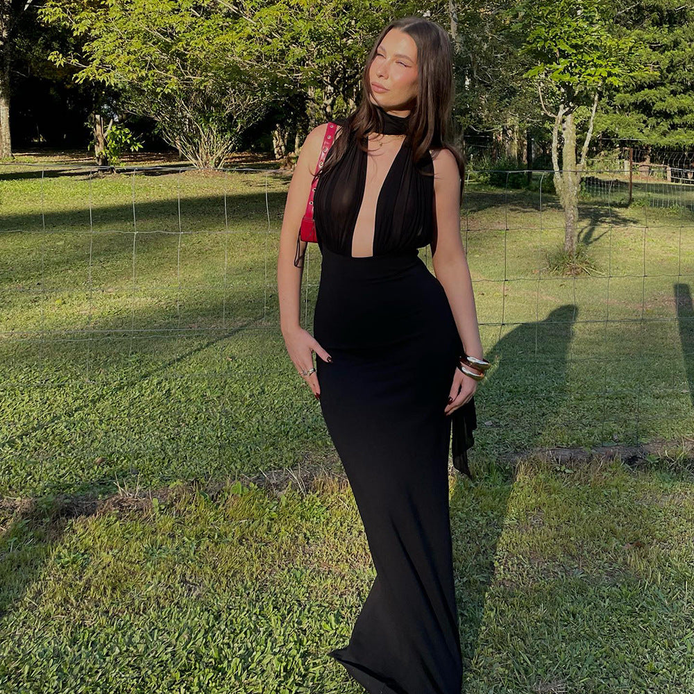 Elegant black halter gown showcasing the Stylish Maxi Dress for modern fashion enthusiasts