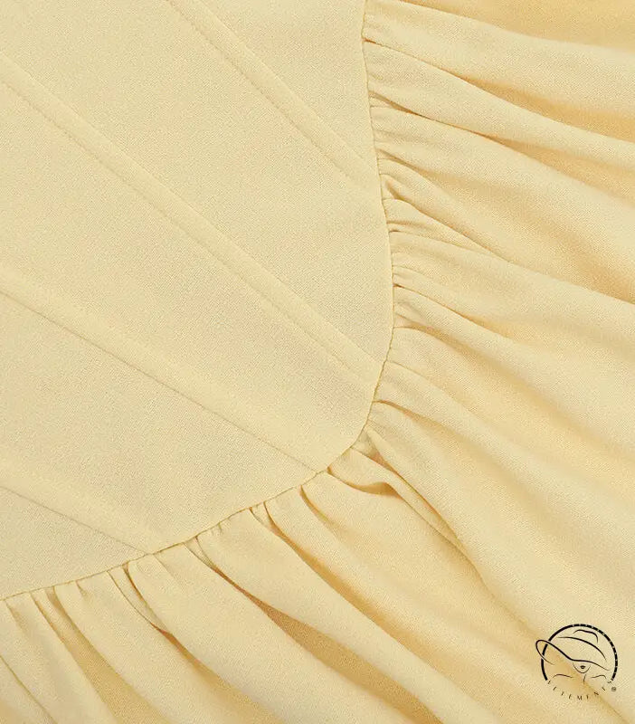 Elegant langry fashion maxi dress with cream ruffled bed skirt edge