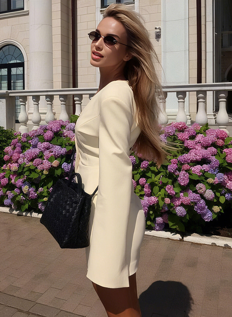 Elegant langry fashion cream blazer with black quilted handbag