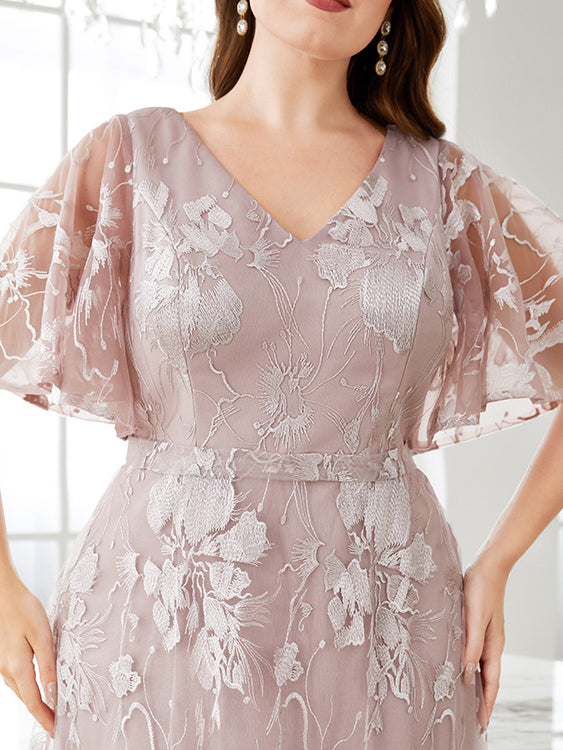 Elegant embroidered floral mauve evening dress with flared sleeves, perfect for fashion or ملابس events