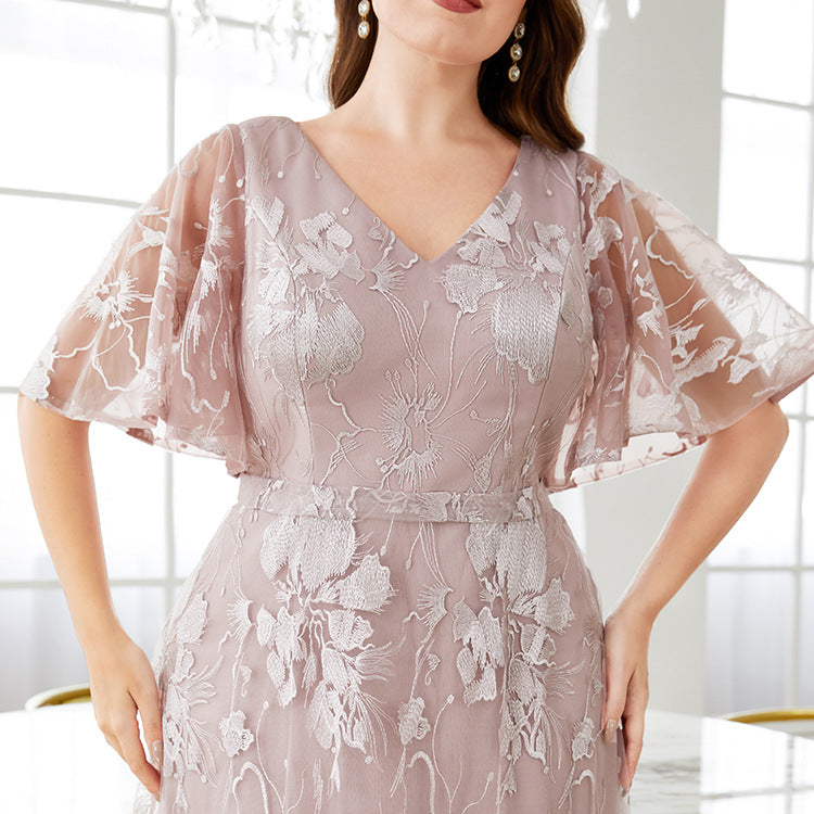 Elegant embroidered floral mauve evening dress with flared sleeves, perfect for fashion or ملابس events