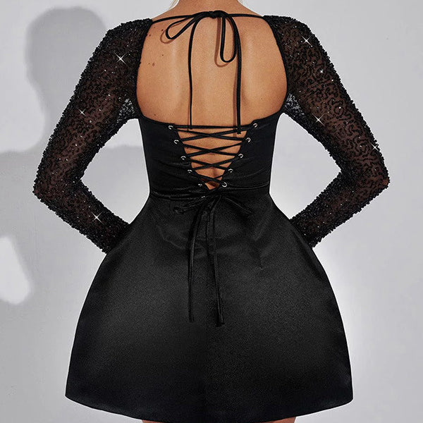 Black long-sleeved Casual Meeting Dress with lace-up back, a stylish fashion choice