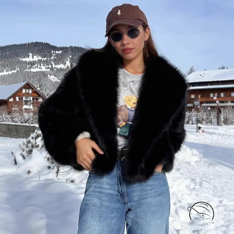 Black faux fur effect plush coat with brown cap