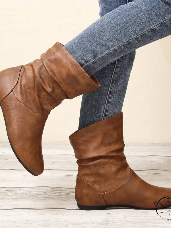Brown slouch ankle faux leather boots in Langry fashion style