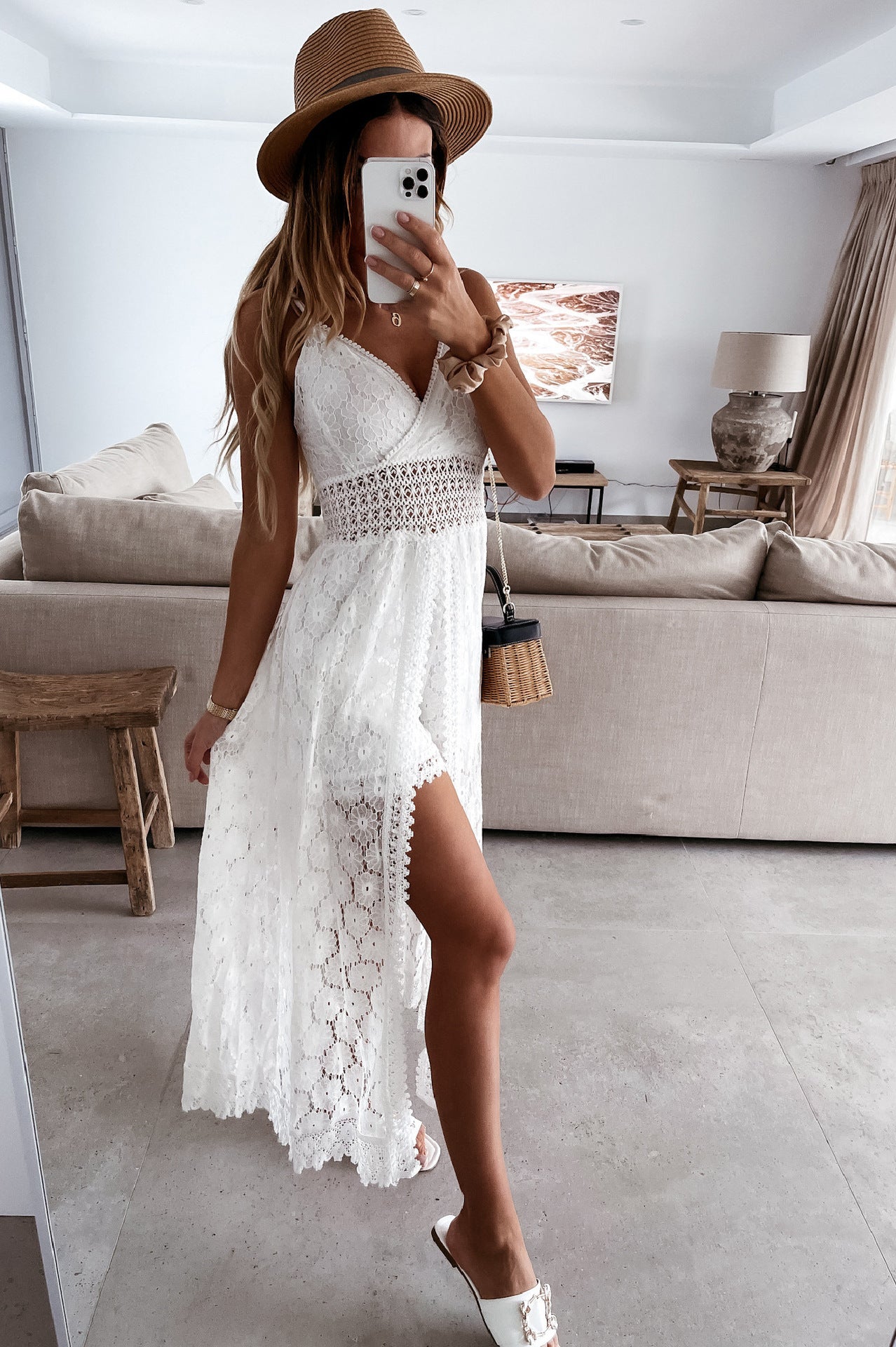 White lace maxi dress with side slit and crochet waist detail for elegant fashion ملابس