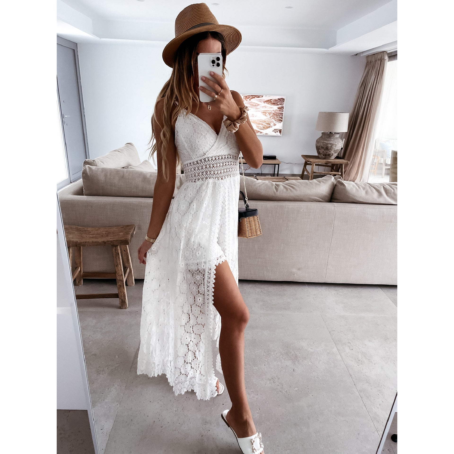 White lace maxi dress with side slit and crochet waist detail for elegant fashion ملابس