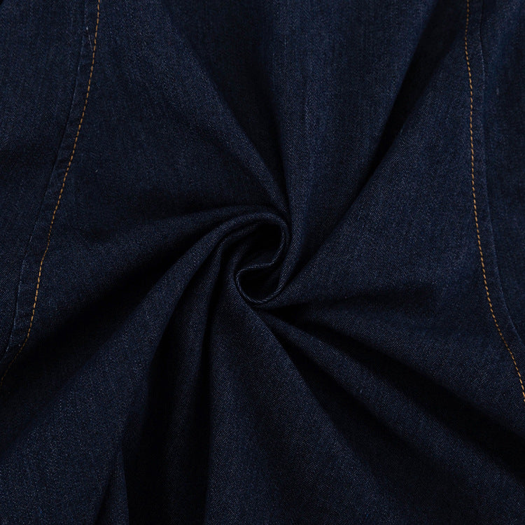 Dark blue denim fabric with yellow stitching and swirl, ideal for denim shirt fashionable dress