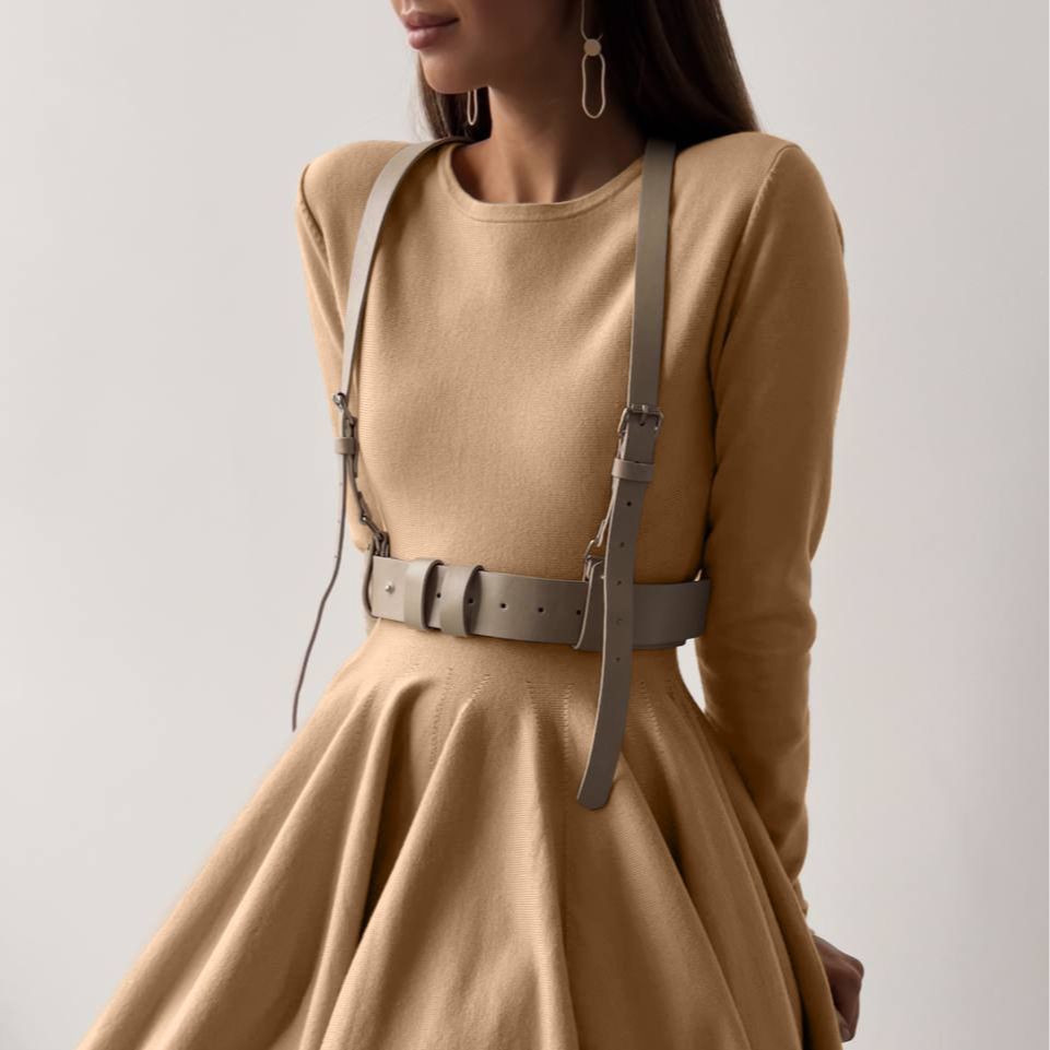 Beige woolen knitted dress with harness belt, part of the beautiful woolen knitted collection