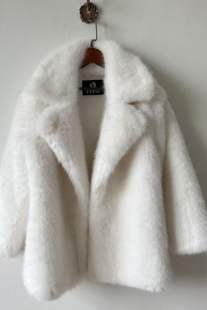 Elegant white faux fur jacket with classic collar and buttons by Langry fashion