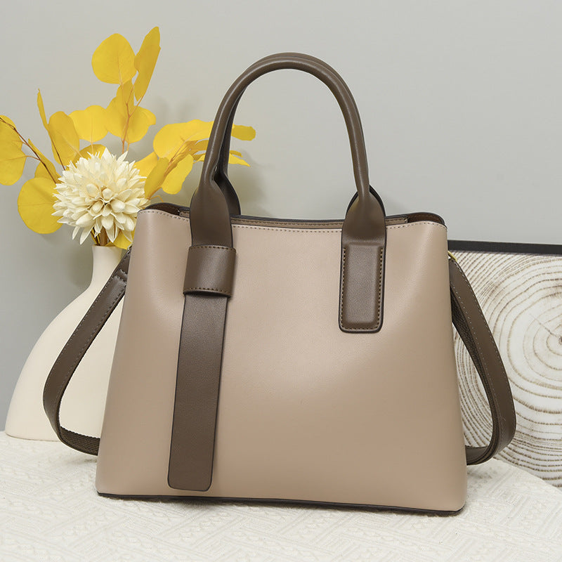 Beige and brown leather handbag, stylish crossbody design for any ملابس fashion look