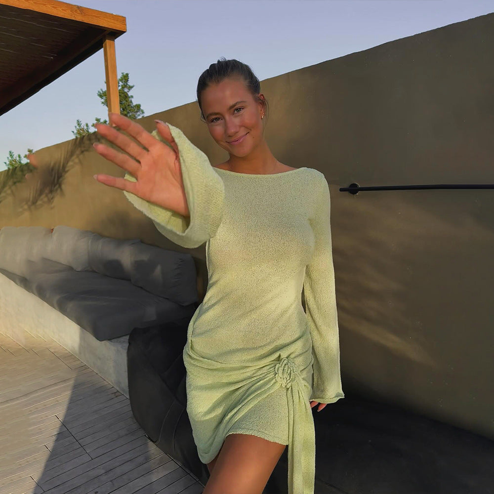 Light green knitted long-sleeved dress showcasing elegant fashion and ملابس style