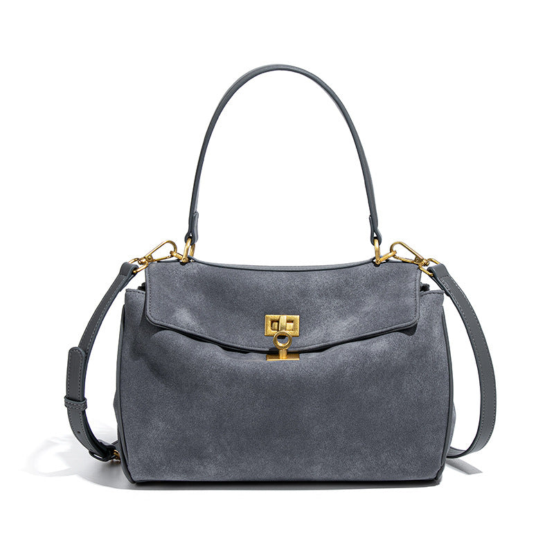 Gray leather handbag with gold hardware from Original Frosted Deerskin Bag, a fashionable accessory