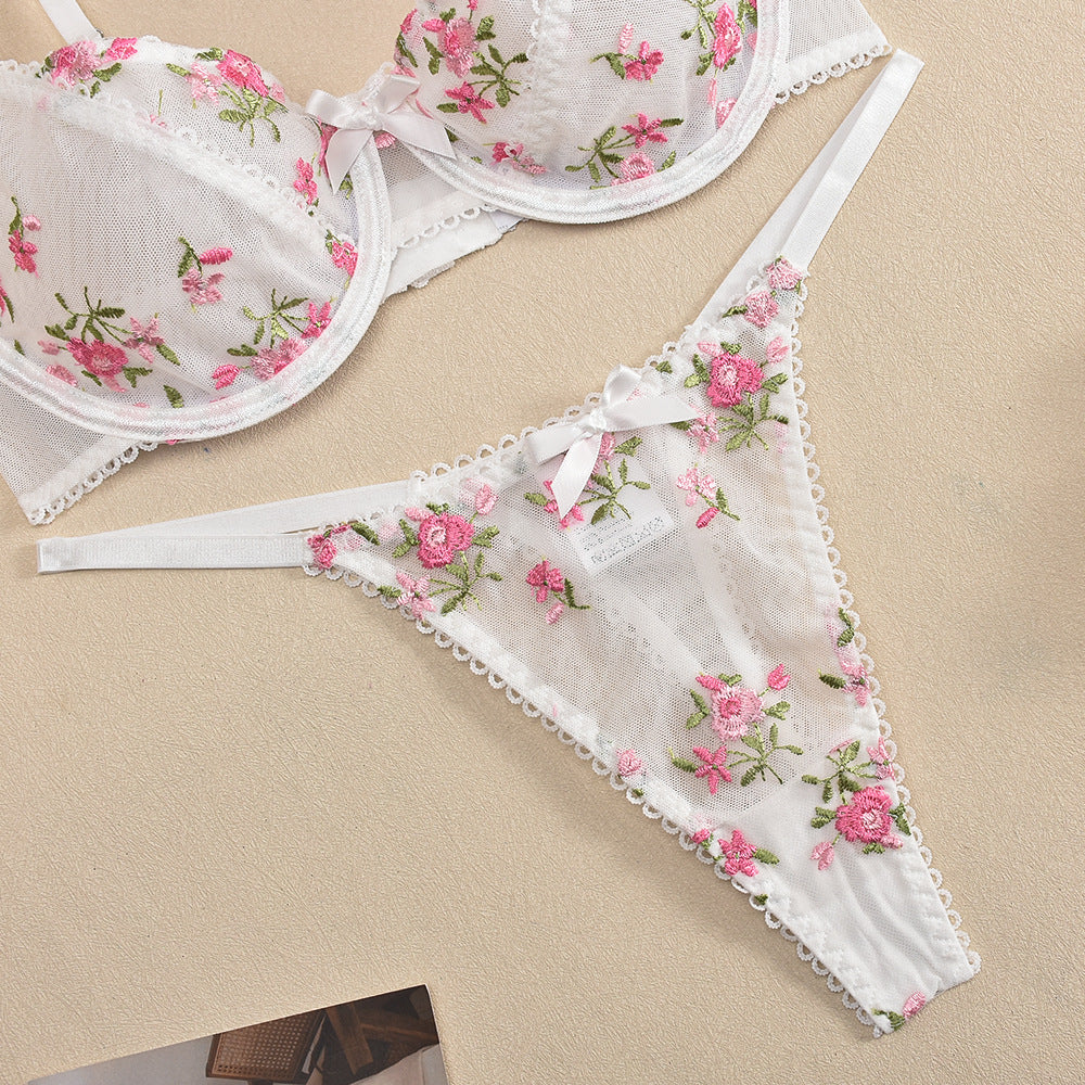 Elegant white floral embroidered lingerie set with sheer mesh, perfect for fashion and ملابس