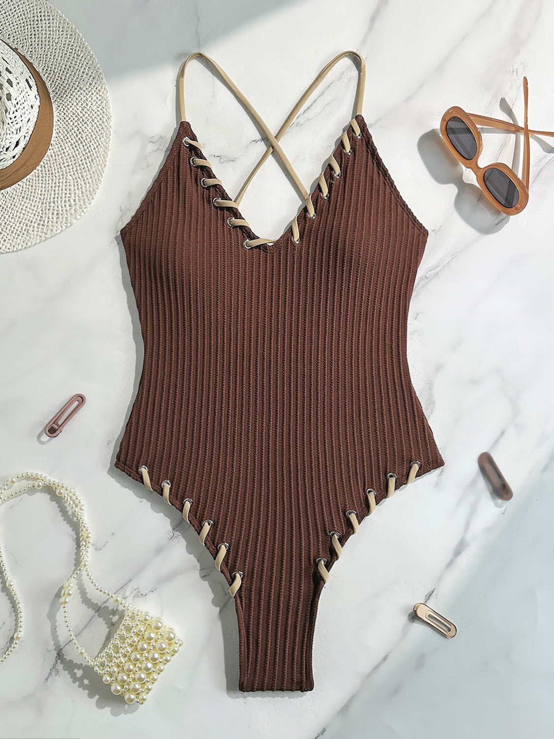 Brown ribbed one-piece swimsuit with white stitching and crisscross straps in Langry fashion