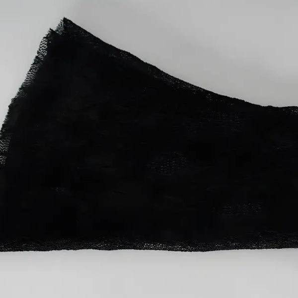 Black brushstroke on lace in stunning Langry fashion dress