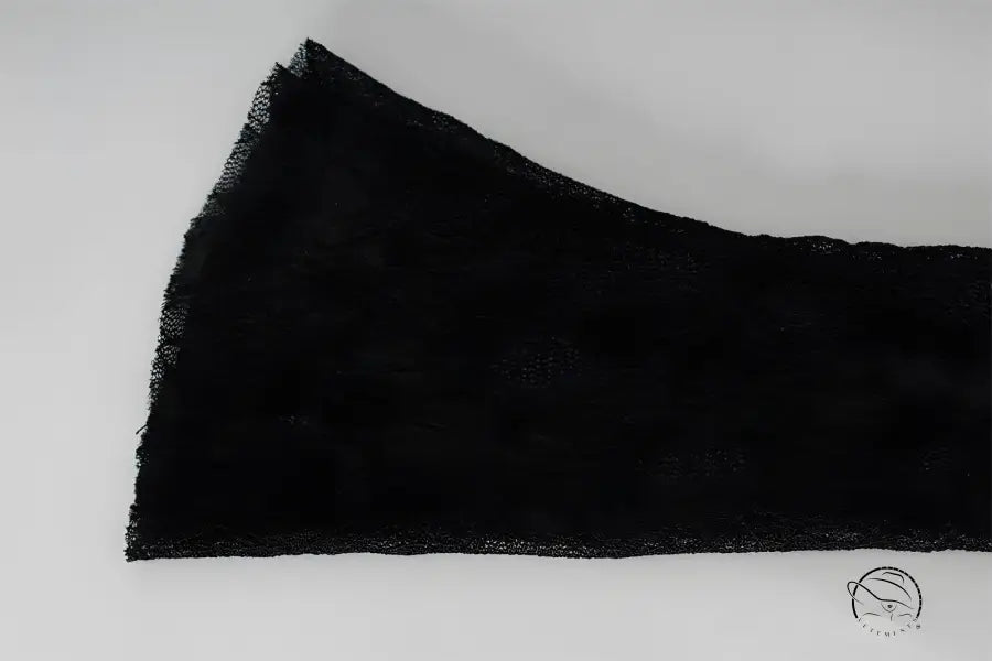 Black brushstroke on lace in stunning Langry fashion dress