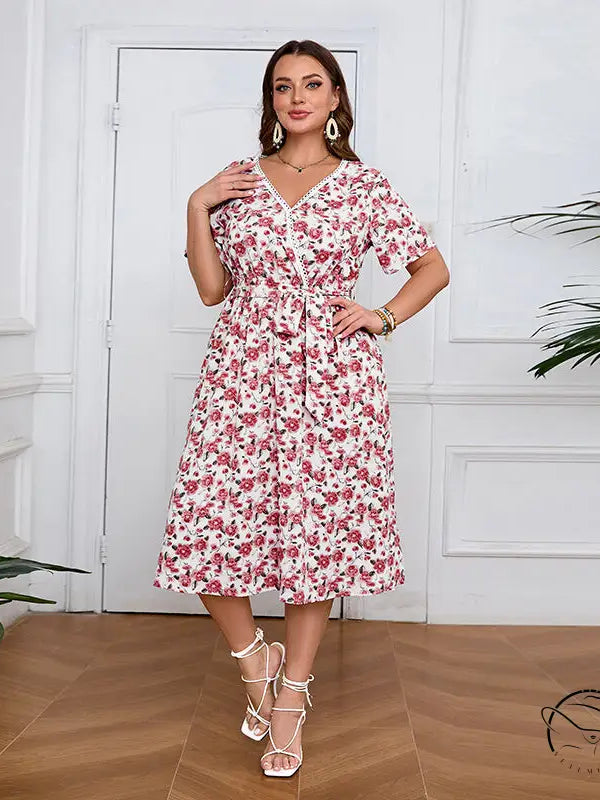 Boho lace floral dress: woman in white pink V-neck midi