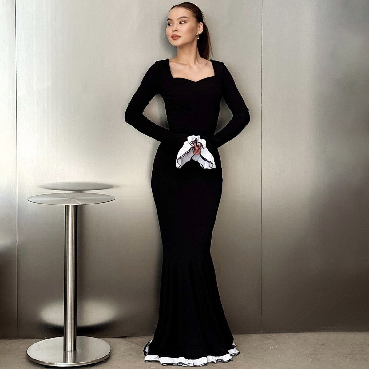 Elegant black mermaid gown from French Slim Slimming Bell Sleeve Dress, perfect for fashion enthusiasts