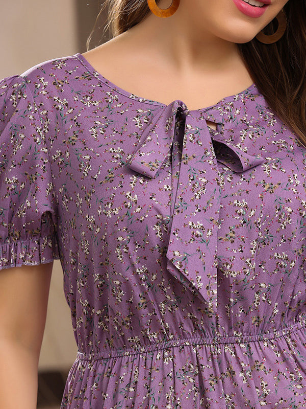 Purple floral dress with puff sleeves and bow neckline for fashionable summer outfits