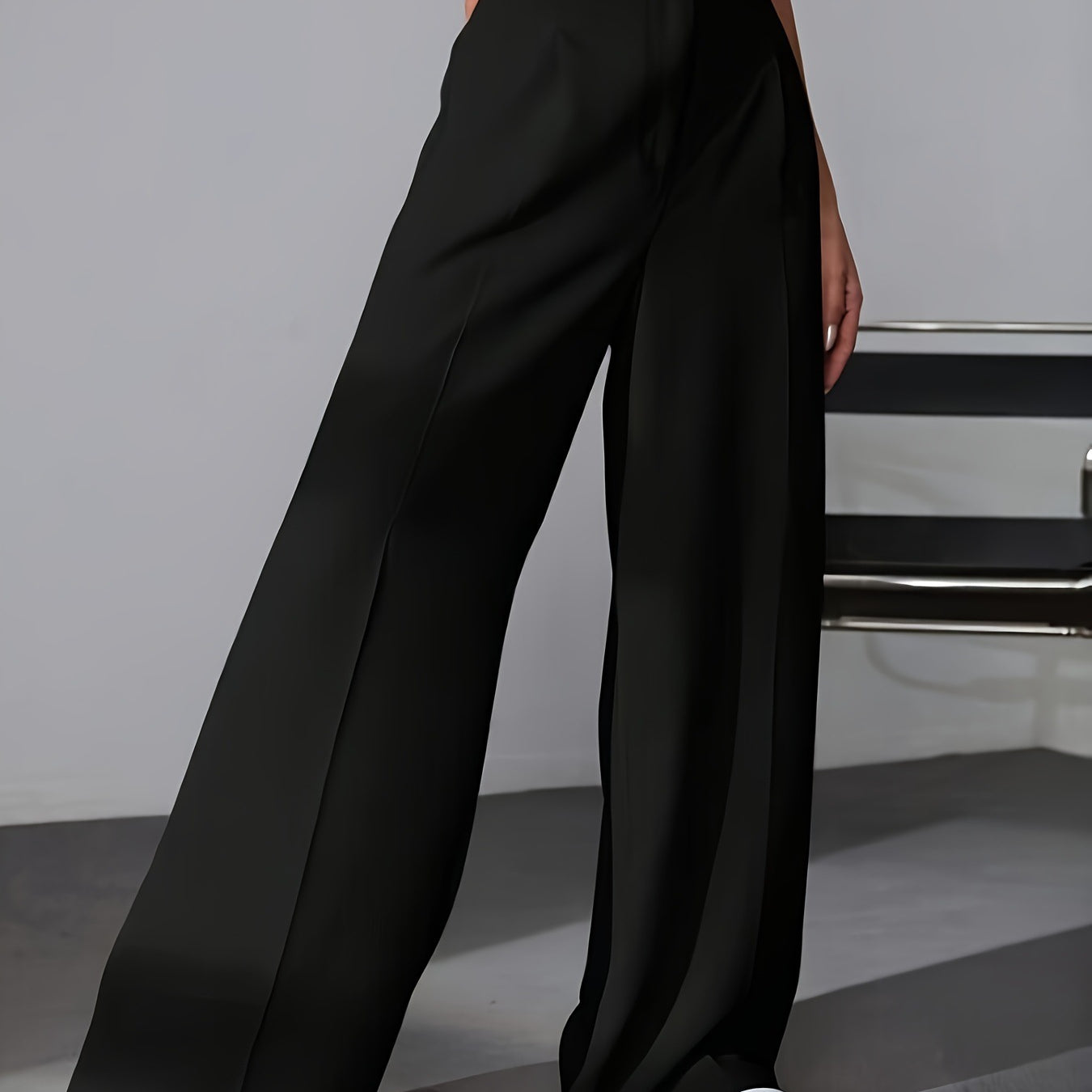 Black wide leg dress pants with front pleat, ideal for fashion-forward work attire