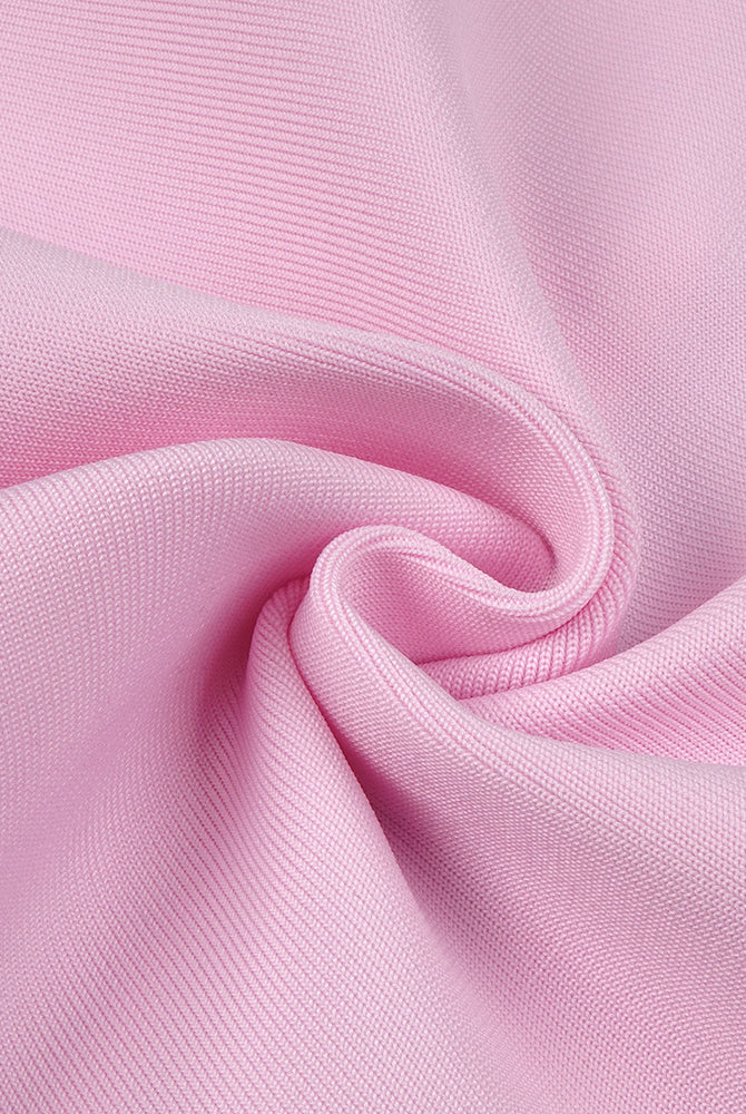 Elegant Pink knitted fabric in a swirl, showcasing a stylish Maxi Dress for fashion enthusiasts