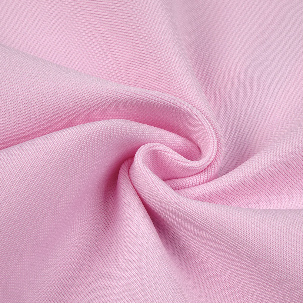 Elegant Pink knitted fabric in a swirl, showcasing a stylish Maxi Dress for fashion enthusiasts