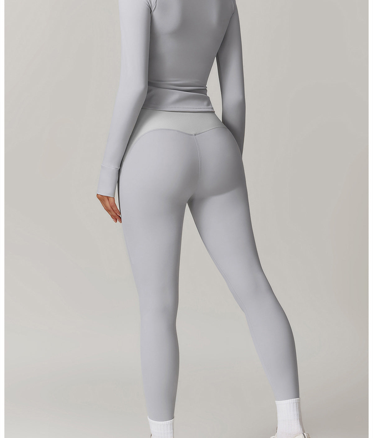 Light gray langry athletic jumpsuit with long sleeves, ideal for fashion and yoga