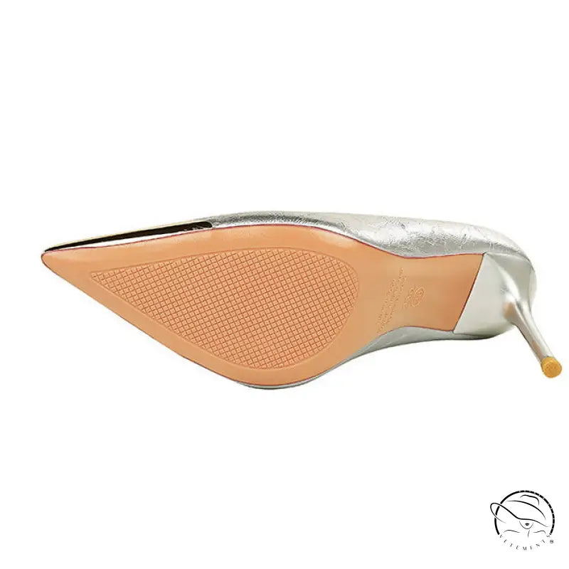 Silver metal pointed super high heel shoe with textured sole by Langry