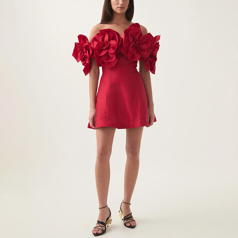 Red mini dress with floral embellishments, perfect for fashion enthusiasts seeking elegance