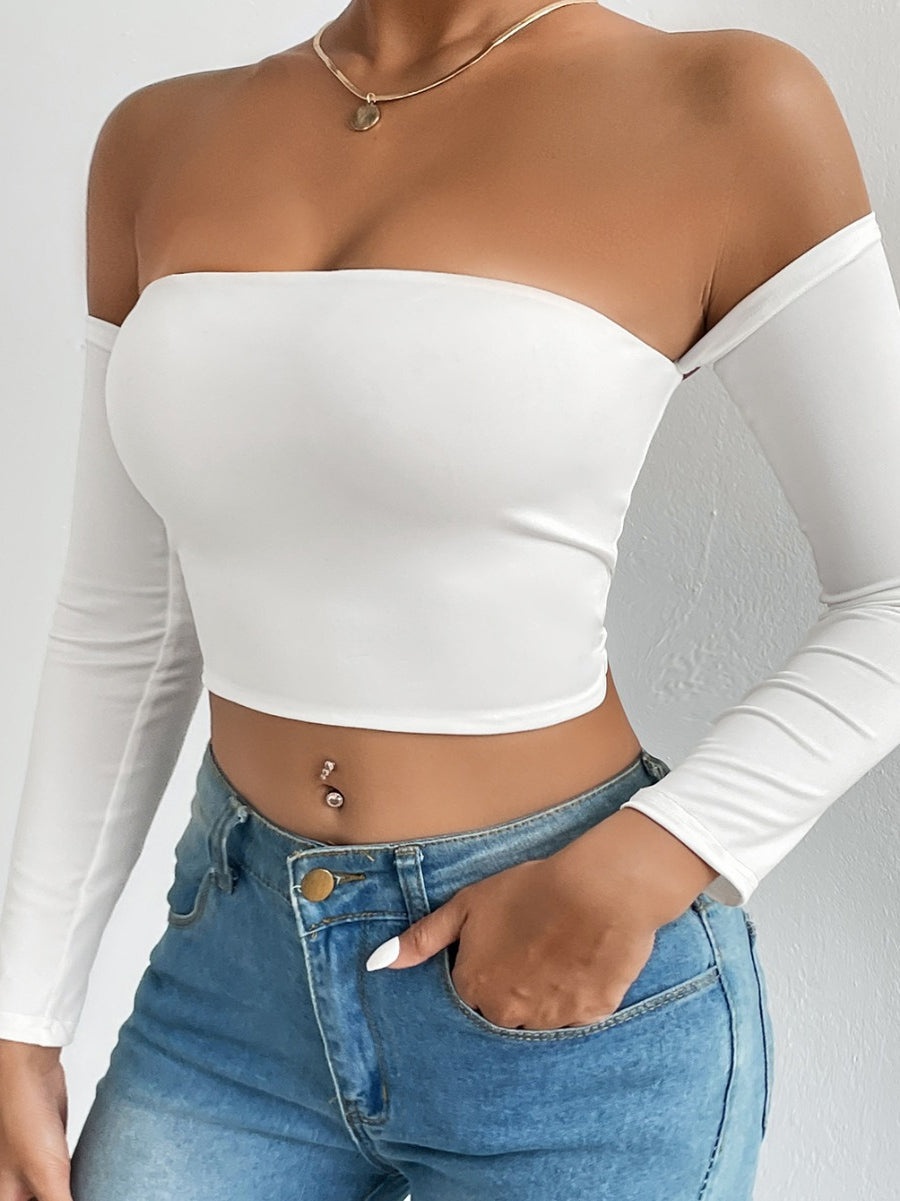 White off-the-shoulder long-sleeve crop top showcasing stylish langry fashion and ملابس trends