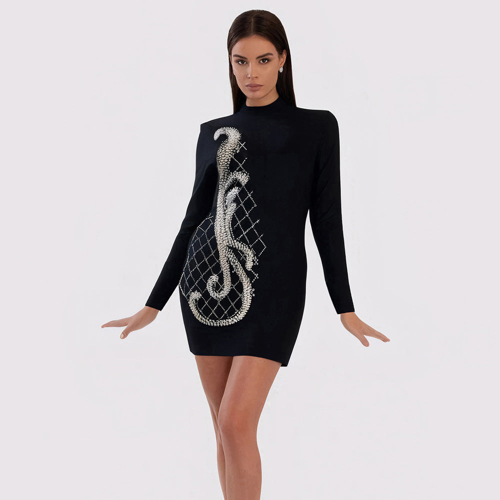 Black turtleneck mini dress with rhinestone snake design for elegant dinner party fashion