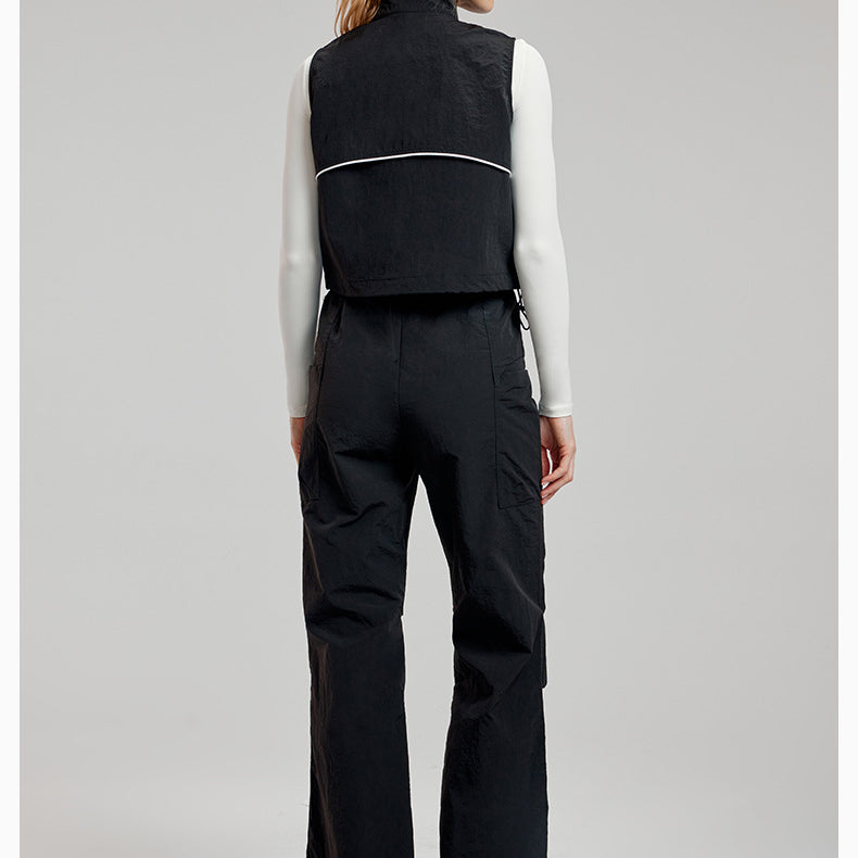 Woman in black vest and pants showcasing Comfy Loose Sports Vest for stylish langry ملابس