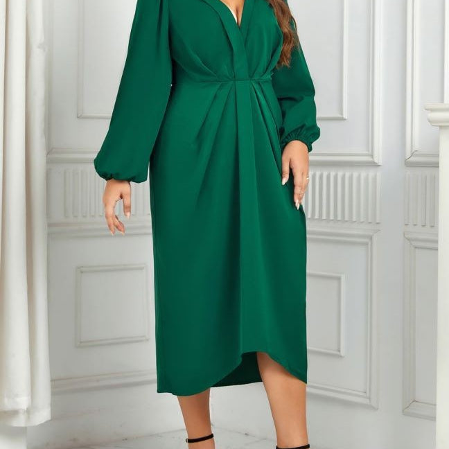 V-Nick Green Dress: Plus-size emerald green midi with balloon sleeves and asymmetrical tulip hem