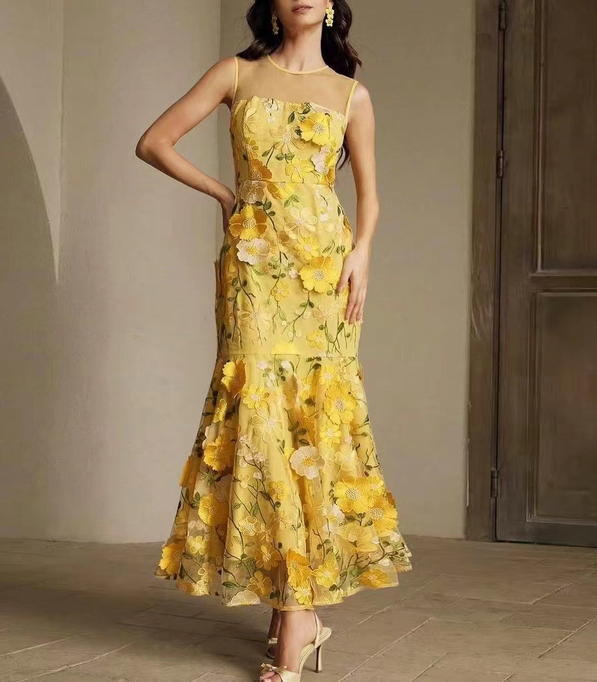 Vibrant yellow Langry fashion floral maxi dress with embroidered blossoms and sheer mesh fishtail bodice